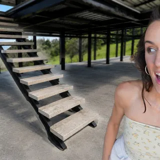 Kaylee in Front of Staircase
